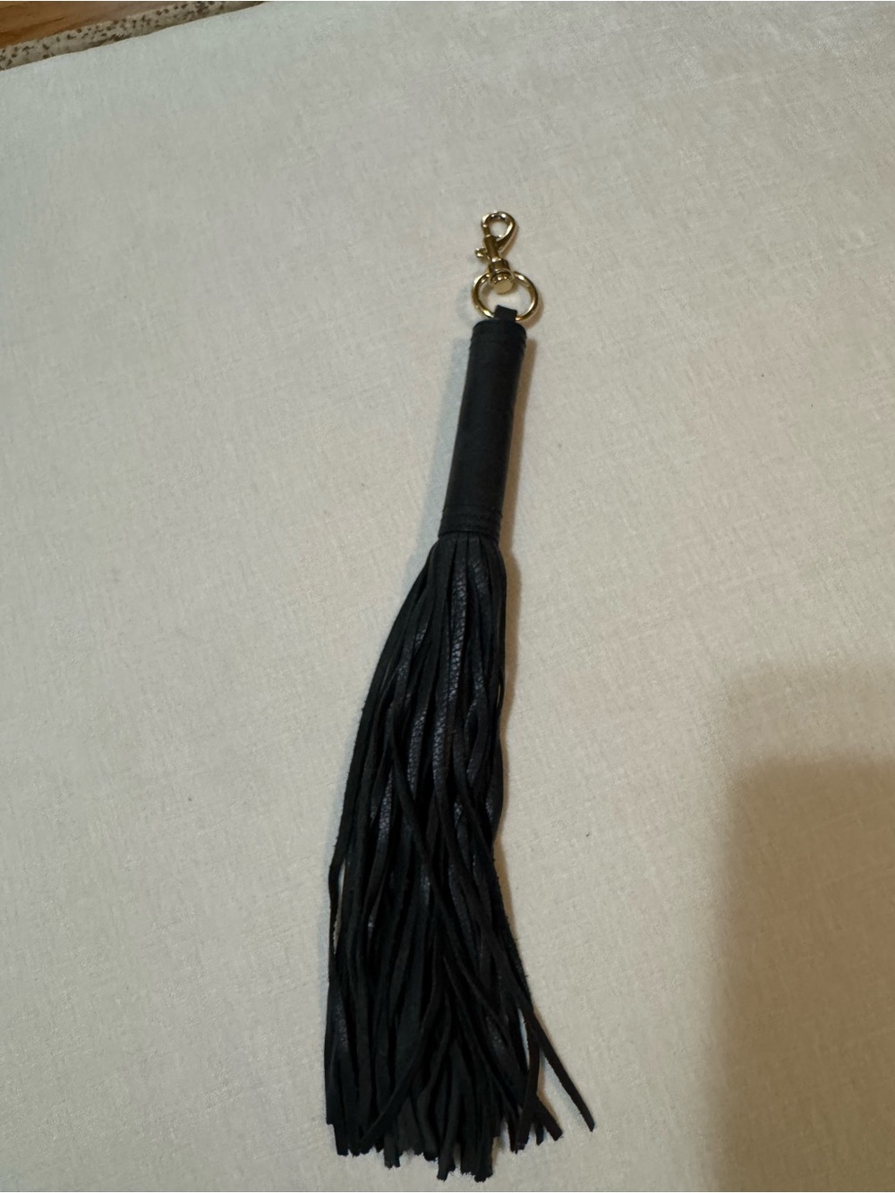 Source Unknown Black Leather Tassel Bag Charm with Gold Hardware 13 in